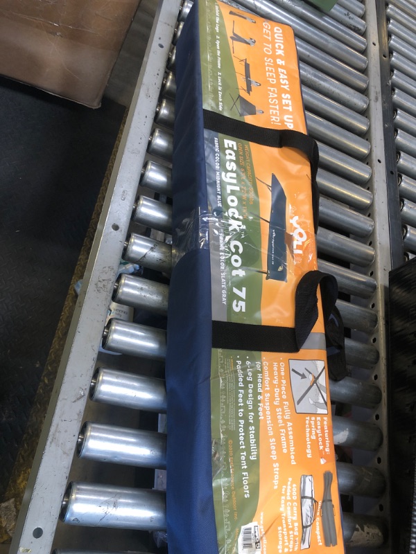 Photo 1 of Get to sleep faster! Yoli's EasyLock Cots' patent pending spring design makes it quick and easy to set up and take down. Unfold the legs, open the frame and lock in each side. That's it. You will be counting sheep in no time!

