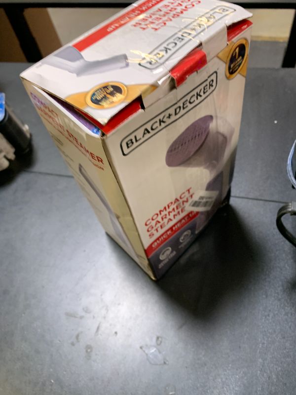 Photo 1 of BLACK+DECKER Compact Handheld Steamer, HGS012P, 25-Second Heat Up, 1000 Watts, Removes Wrinkles from Fabrics, Clothing and Upholstery