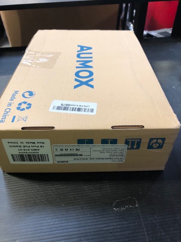 Photo 1 of Aumox 18-Port Ethernet Gigabit PoE Switch, 16-Port PoE with 2 Uplink Gigabit Ports, 250W Built-in Power, Metal Casing and 19-inch Rackmount, Traffic Optimization, Plug and Play, Unmanaged(SG518P)