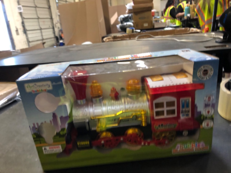Photo 1 of ArtCreativity Bubble Blowing Toy Train with Lights & Sounds, Bump and Go Toddler Train Toys for Around The Tree, Kids Bubble Machine, for Boys & Girls Ages 1-6