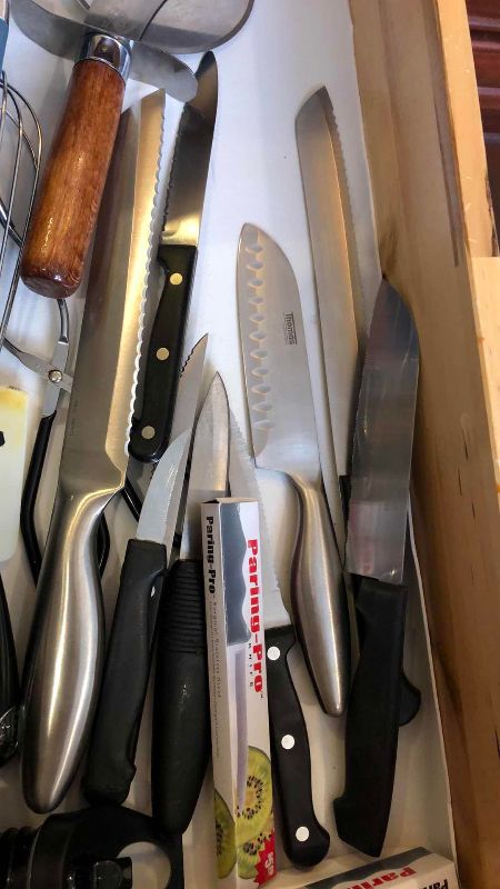 Photo 1 of CONTENTS OF DRAWER: KNIVES AND SERVING UTENSILS