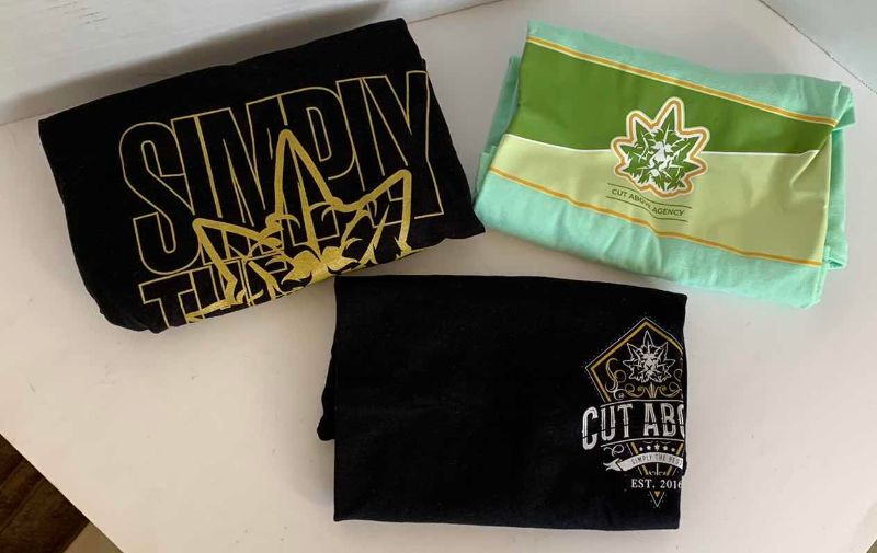 Photo 1 of COLLECTION OF CUT ABOVE, BEANIE, SCARF, SHIRTS (3) SIZE S