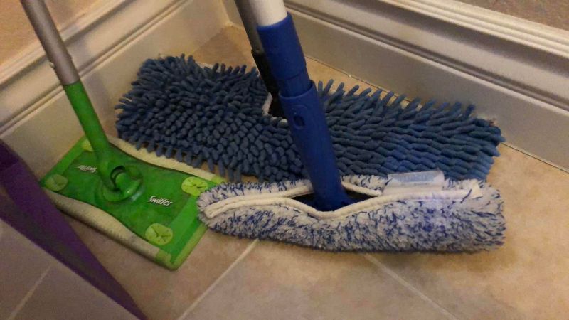 Photo 1 of FIVE DRAWER STORAGE CABINET WITH WHEELS AND HARD FLOOR CLEANING TOOLS