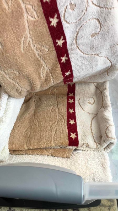 Photo 1 of TWO TUBS OF CHRISTMAS THEMED TOWELS