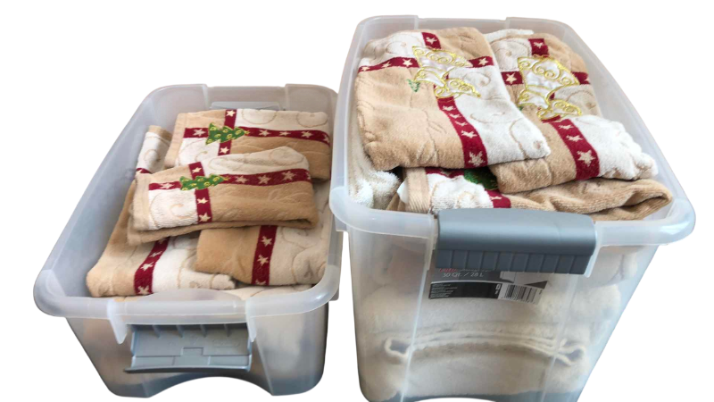 Photo 1 of TWO TUBS OF CHRISTMAS THEMED TOWELS