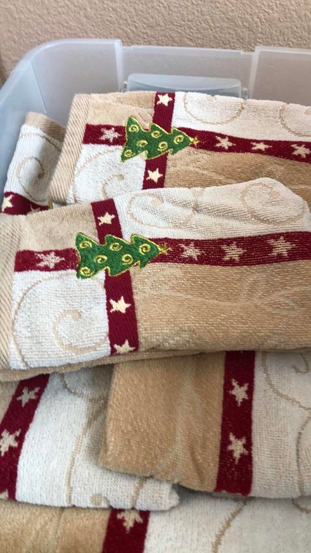 Photo 1 of TWO TUBS OF CHRISTMAS THEMED TOWELS