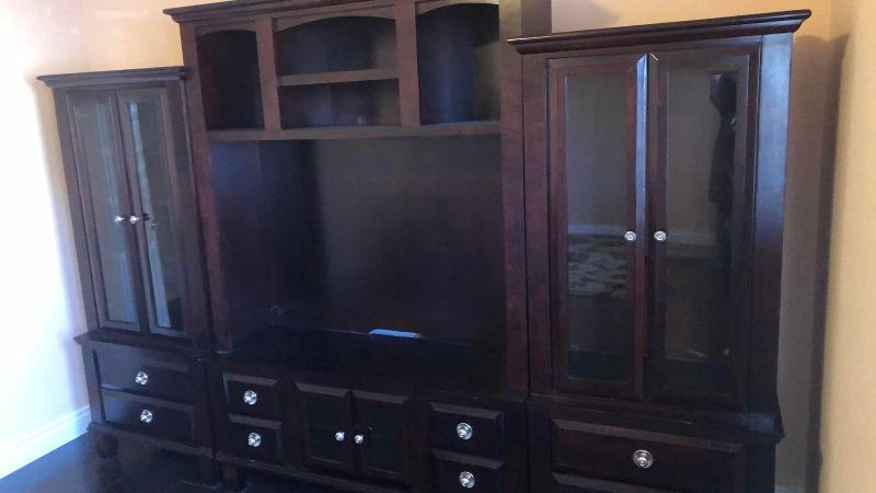 Photo 1 of THREE PIECE WOODEN ENTERTAINMENT CENTER WITH GLASS SHELVES 119” X 19” H 82”