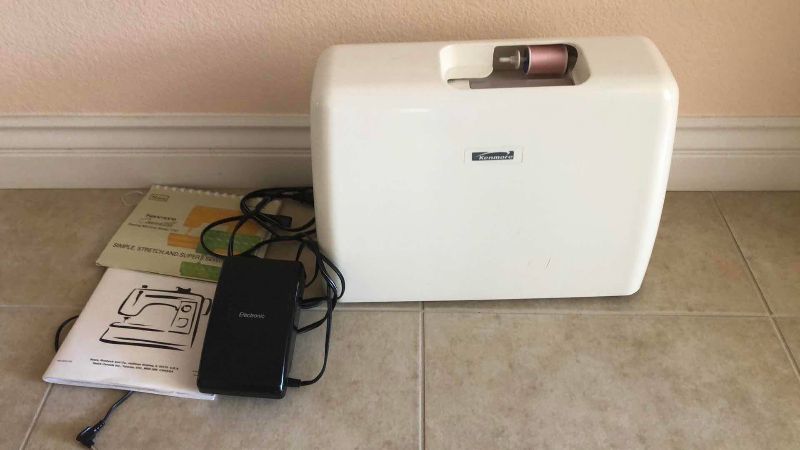 Photo 1 of VINTAGE COMPUTERIZED KENMORE SEWING MACHINE MODEL 385.19233400