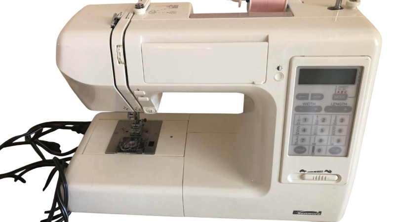 Photo 1 of VINTAGE COMPUTERIZED KENMORE SEWING MACHINE MODEL 385.19233400