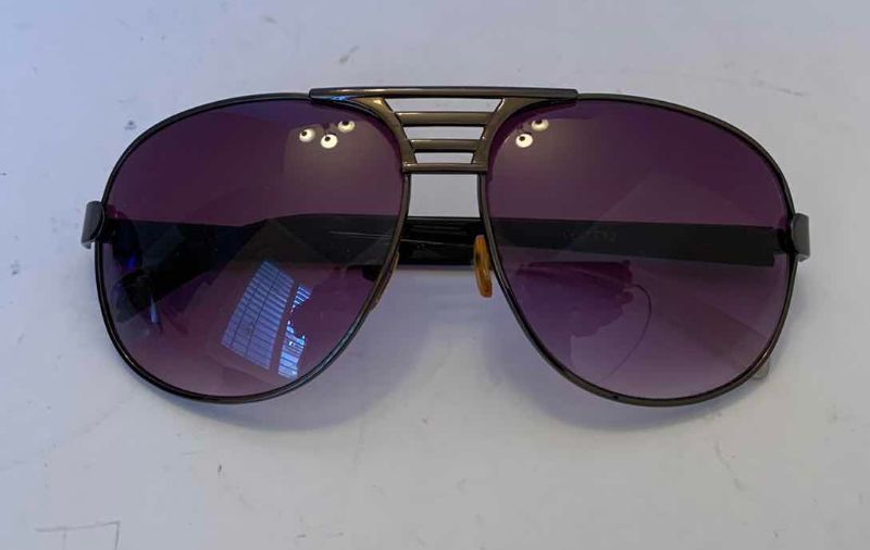 Photo 1 of THREE PAIRS OF SUNGLASSES