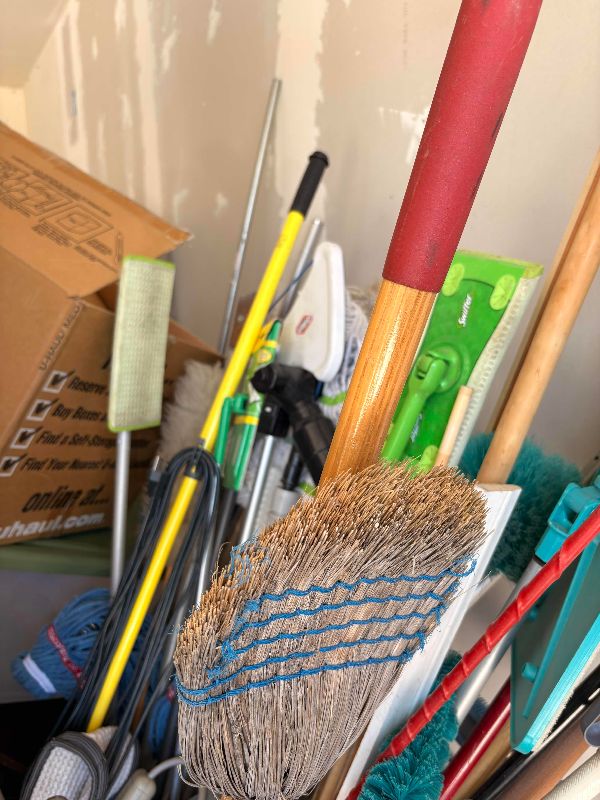 Photo 1 of BIN OF GARDENING & CLEANING TOOLS