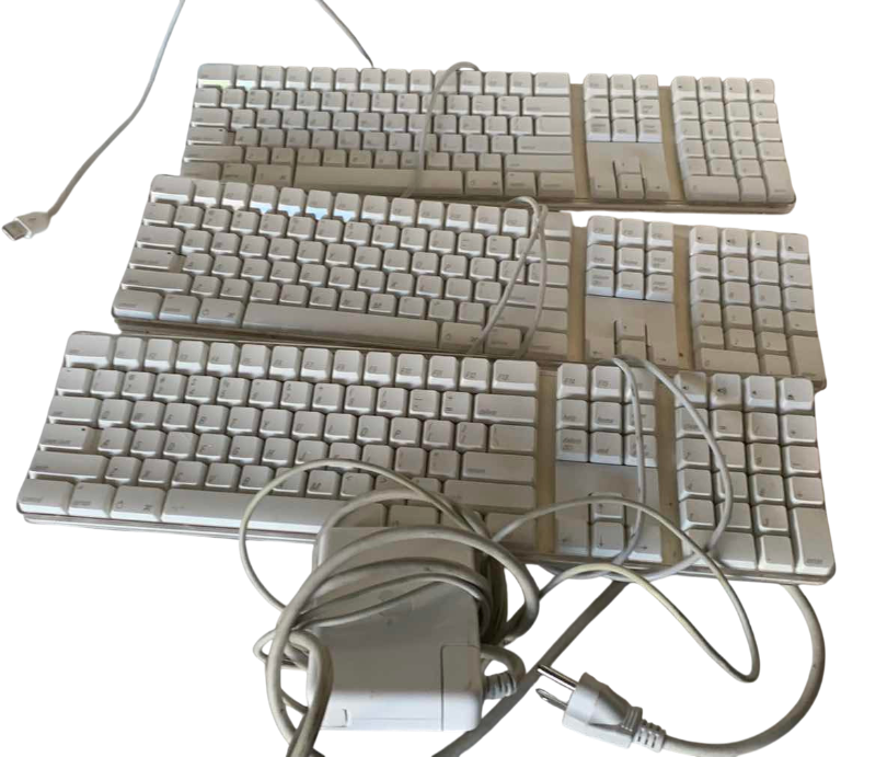 Photo 1 of APPLE KEYBOARDS AND POWER SUPPLY