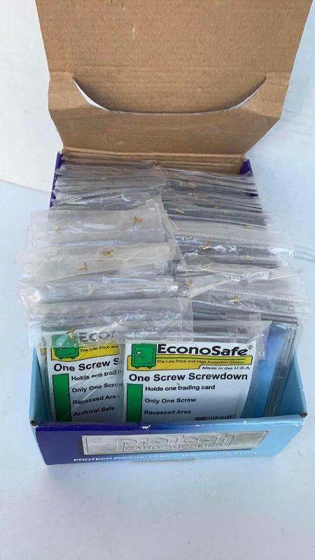 Photo 1 of TRADING CARD 1 SCREW HOLDERS