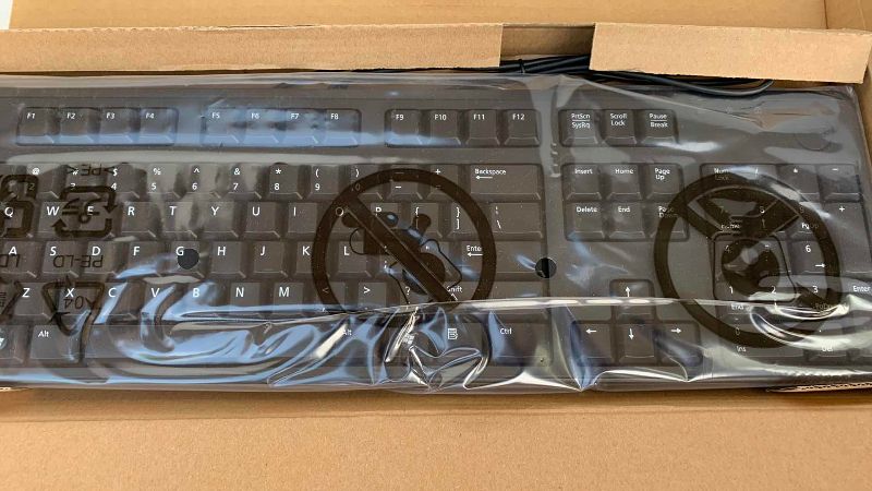 Photo 1 of DELL KEYBOARDS AND A MOUSE
