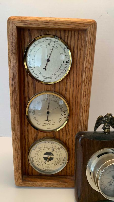 Photo 1 of VINTAGE OAKWOOD THREE DOLLAR WALL WEATHER STATION AND UNITED STATES INSPIRED THE THERMOMETER