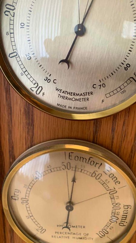 Photo 1 of VINTAGE OAKWOOD THREE DOLLAR WALL WEATHER STATION AND UNITED STATES INSPIRED THE THERMOMETER