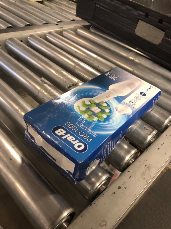 Photo 1 of Oral-B Pro 1000 Rechargeable Electric Toothbrush, White