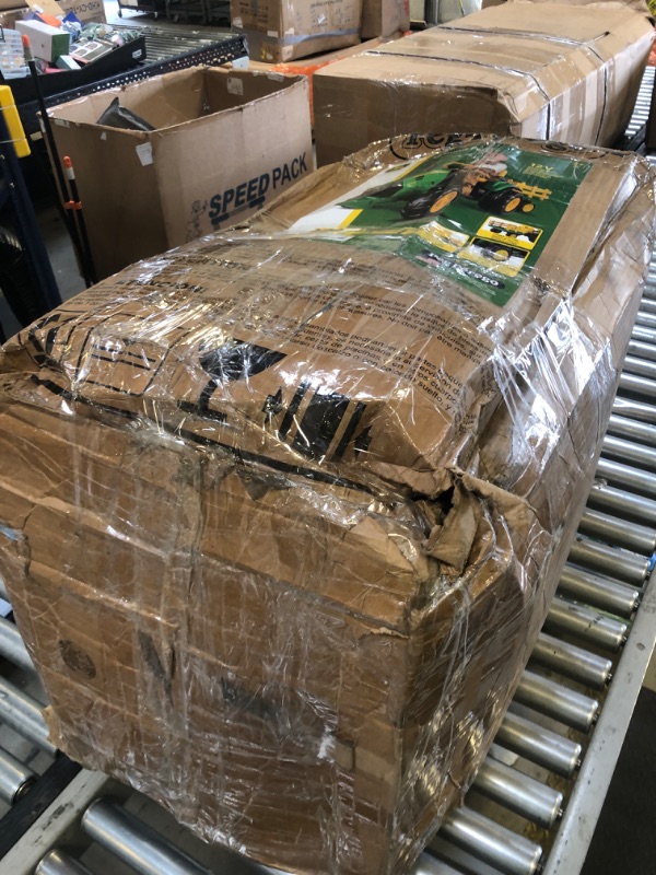 Photo 1 of Peg Perego John Deere Ground Force Tractor with Trailer 12 Volt Ride on