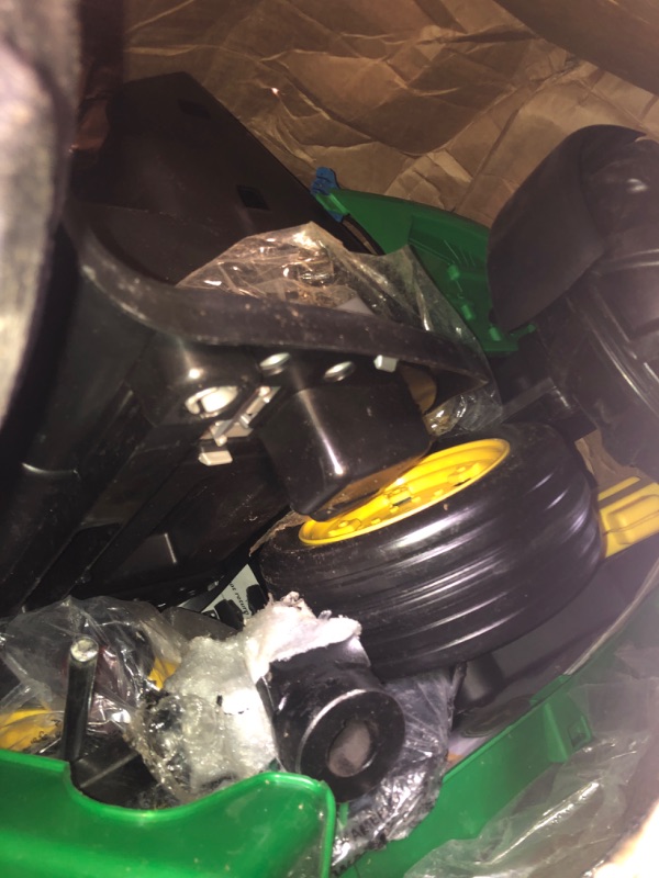 Photo 1 of Peg Perego John Deere Ground Force Tractor with Trailer 12 Volt Ride on