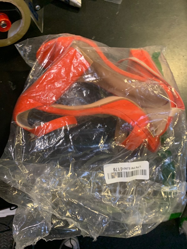 Photo 1 of WOMENS HEELS ORANGE SIZE 7