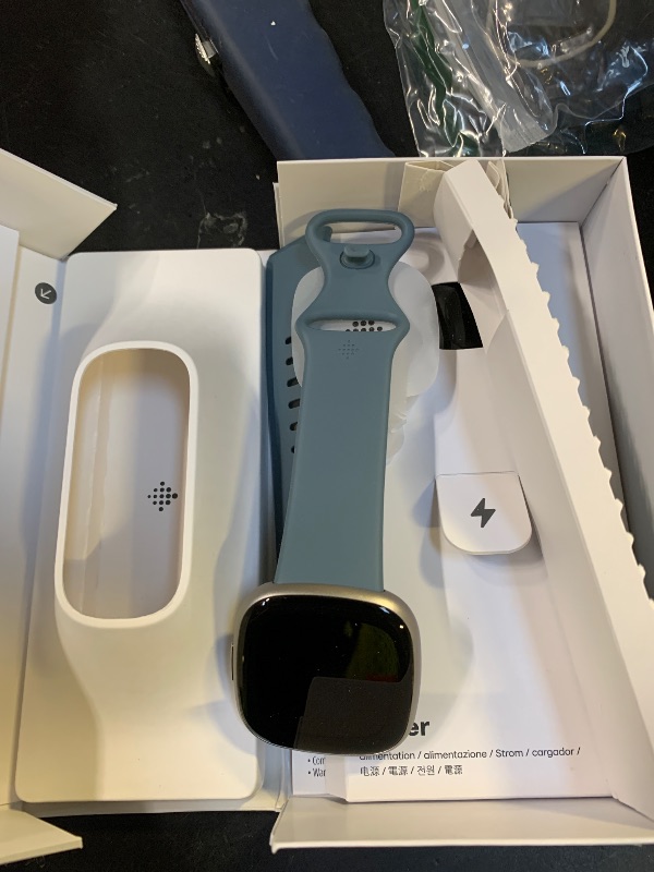Photo 1 of Fitbit Versa 4 Fitness Smartwatch with Daily Readiness, GPS, 24/7 Heart Rate, 40+ Exercise Modes, Sleep Tracking and more, Waterfall Blue/Platinum, One Size (S & L Bands Included)