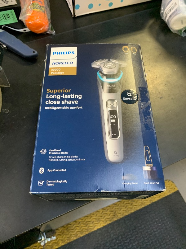 Photo 1 of Philips Norelco Shaver i9000 Prestige, Wet & Dry Electric Shaver, Dark Slate Nova, SenseIQ Technology, Triple Lift & Cut System, 360 Rotating Dual SteelPrecision Blades, Charging Stand, XP9204/85