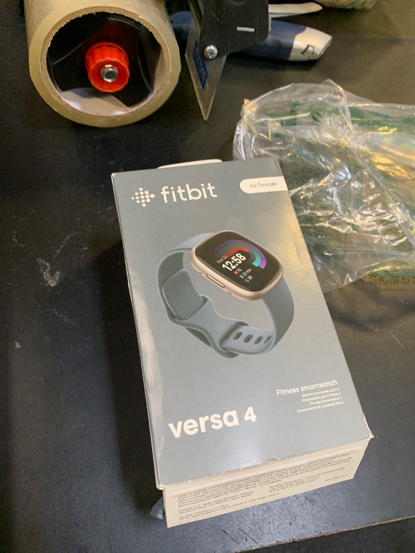 Photo 1 of Fitbit Versa 4 Fitness Smartwatch with Daily Readiness, GPS, 24/7 Heart Rate, 40+ Exercise Modes, Sleep Tracking and more, Waterfall Blue/Platinum, One Size (S & L Bands Included)