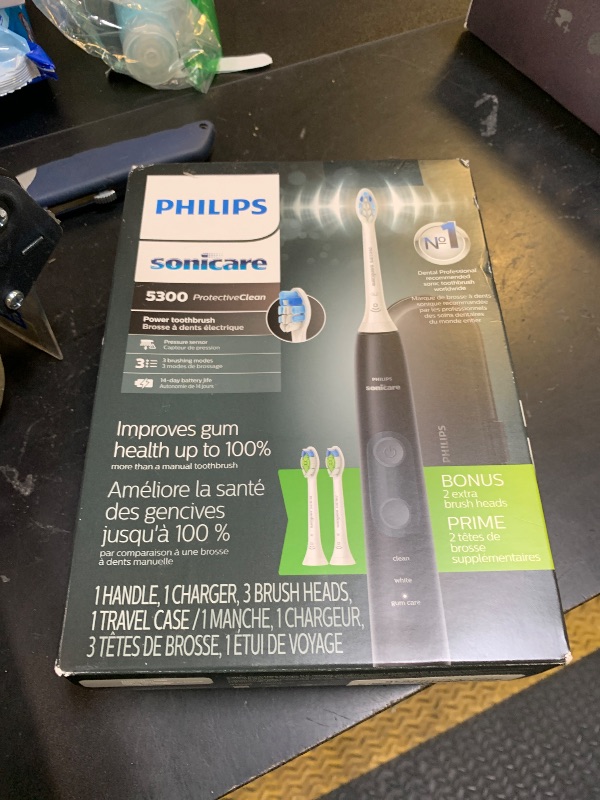 Photo 1 of Philips Sonicare ProtectiveClean 5300 Rechargeable Electric Toothbrush, with Pressure Sensor, 3 Cleaning Modes, SmarTimer and QuadPacer, with 2 Bonus Brush Heads, Travel Case, Black, Model HX6423/34
