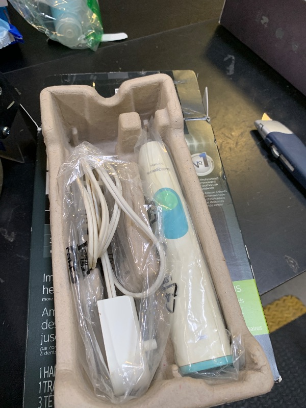 Photo 1 of Philips Sonicare ProtectiveClean 5300 Rechargeable Electric Toothbrush, with Pressure Sensor, 3 Cleaning Modes, SmarTimer and QuadPacer, with 2 Bonus Brush Heads, Travel Case, Black, Model HX6423/34