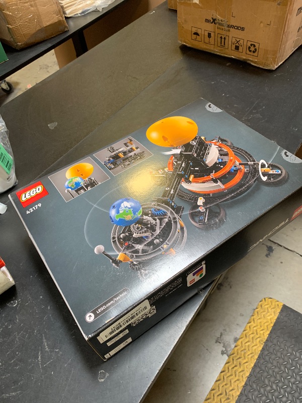 Photo 1 of LEGO Technic Planet Earth and Moon in Orbit Building Set, Outer Space Birthday Gift for 10 Year Olds, Solar System Space Toy for Imaginative, Independent Play, Space Room Décor for Boys & Girls, 42179