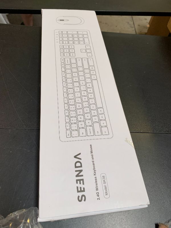 Photo 1 of Wireless Keyboard and Mouse Combo - Full Size Slim Thin Wireless Keyboard Mouse with Numeric Keypad 2.4G Stable Connection Adjustable DPI (White & Silver)