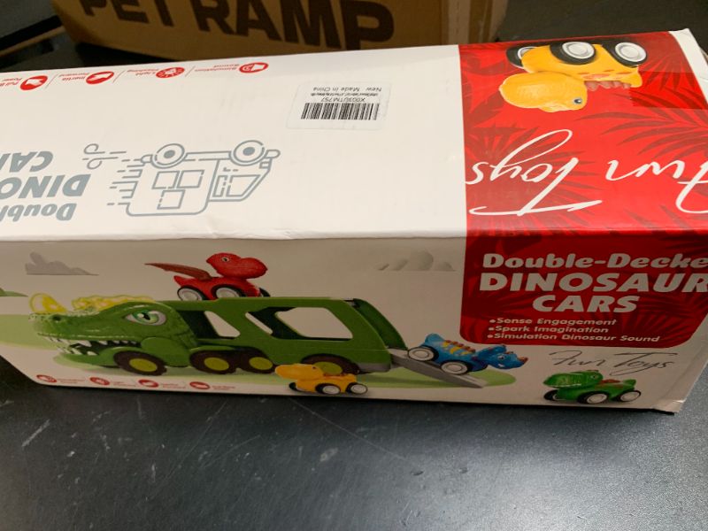 Photo 1 of Toddler Car Toys for 1 2 3 4 Year Old Boy Kids Toys 5-in-1 Dinosaur Transport Carrier Trucks Toys for Boys 1-3 with Sounds & Lights Toddler Toys for Boys Age 1-2 2-4 Dinosaur Toys for Kids 3-5 4-6