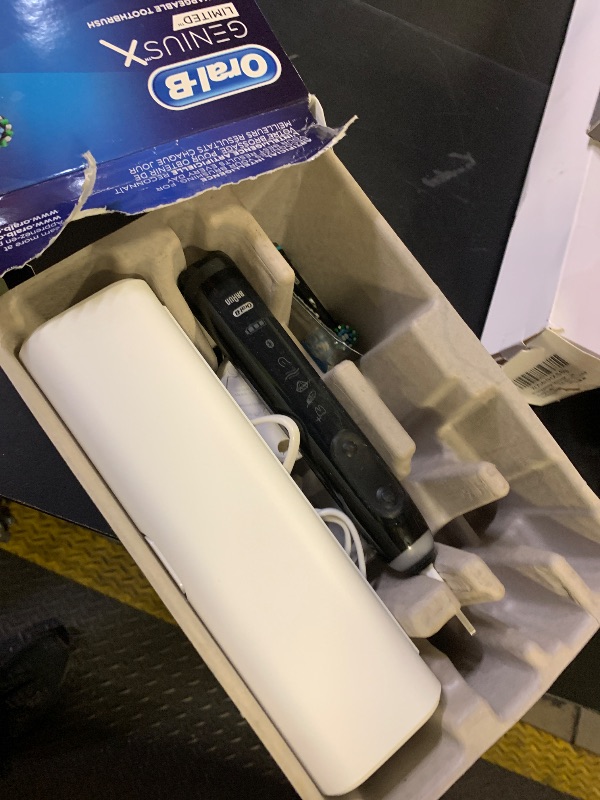 Photo 1 of Oral-B Genius X Limited Rechargeable Electric Toothbrush with 1 Replacement Brush Head, Travel Case, Midnight Black