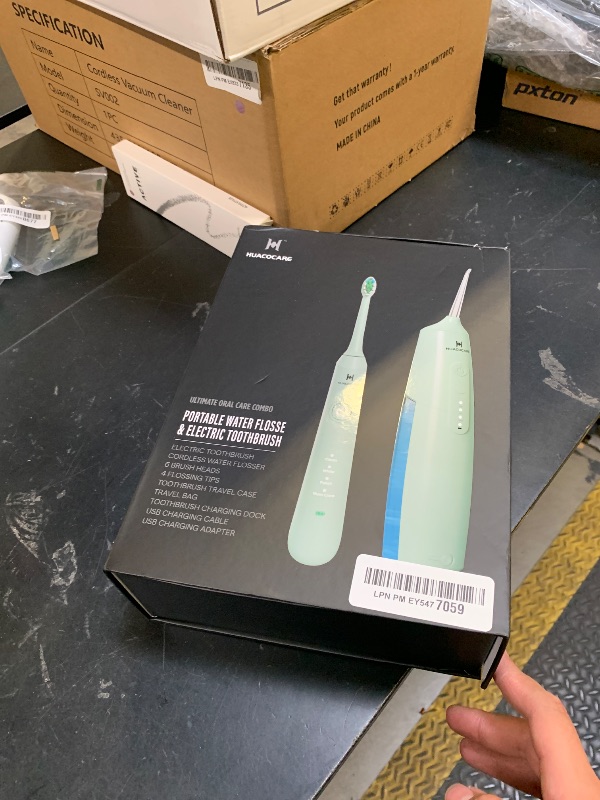 Photo 1 of 2-1 Oral Clean Kit- Water Dental flosser & Electric Toothbrush Combo- Brushing & Flossing- for Teeth Cleaning and Gum Health (Light Green)