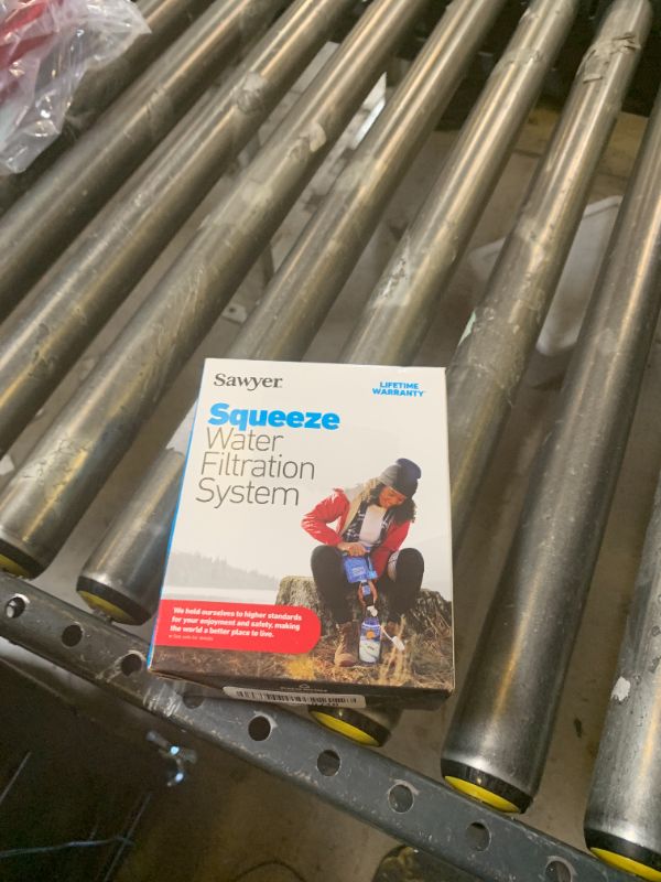 Photo 1 of Sawyer Products SP129 Squeeze Water Filtration System w/ Two 32-Oz Squeeze Pouches, Straw, and Hydration Pack Adapter