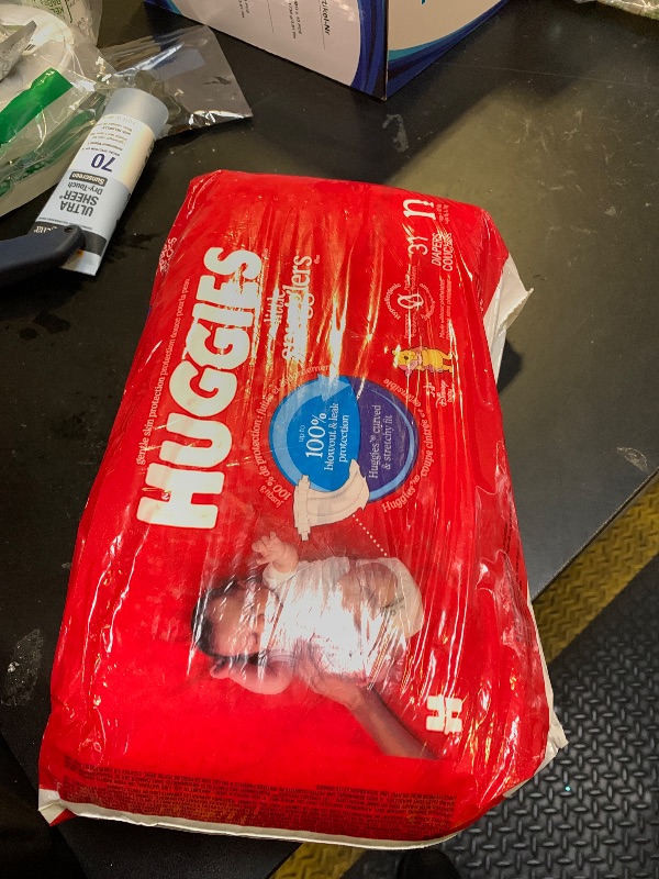 Photo 1 of Huggies Size Newborn Diapers, Little Snugglers Baby Diapers, Size Newborn (up to 10 lbs), 31 Count, Packaging May Vary