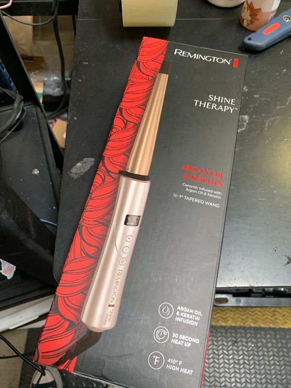 Photo 1 of Remington Shine Therapy Argan Oil & Keratin Infused ½-1 Inch Tapered Curling Wand for Natural Curls, Includes Heat Glove