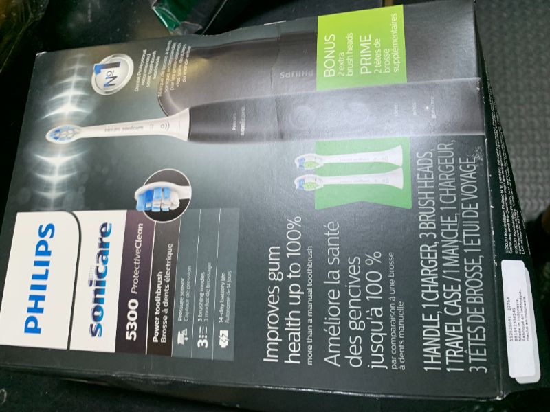 Photo 1 of Philips Sonicare ProtectiveClean 5300 Rechargeable Electric Toothbrush, with Pressure Sensor, 3 Cleaning Modes, SmarTimer and QuadPacer, with 2 Bonus Brush Heads, Travel Case, Black, Model HX6423/34