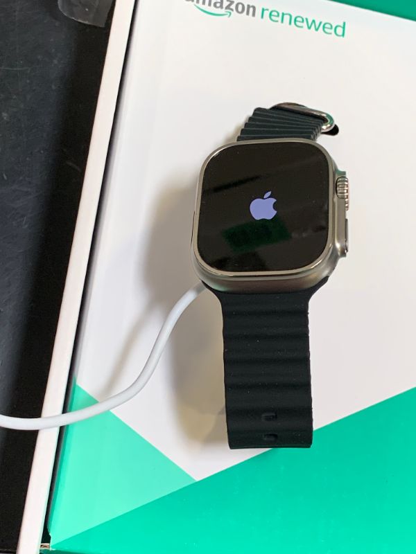 Photo 1 of Apple Watch Ultra [GPS + Cellular 49mm] Titanium Case with Midnight Ocean Band, One Size (Renewed Premium)