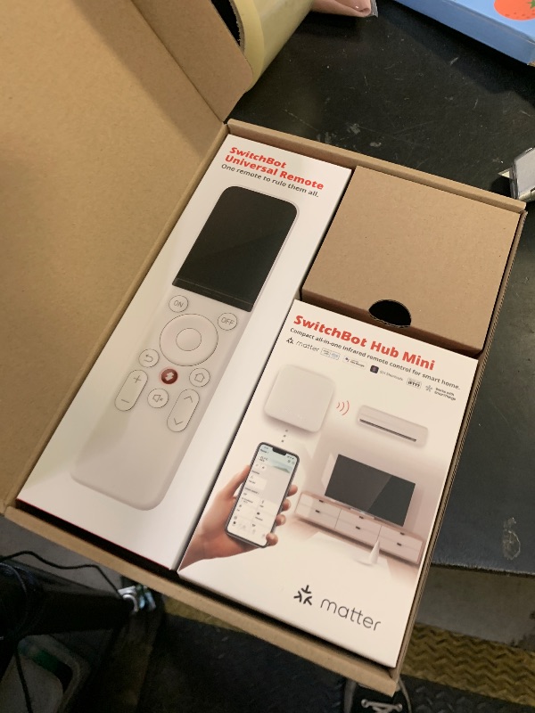 Photo 1 of SwitchBot Universal Remote Control with Hub Mini Matter Enabled, Multi-use Smart Remote with Customize App, Control 25 IR/Bluetooth Devices and 10 Scenes, Compatible with TV/AC/SwitchBot BLE Devices