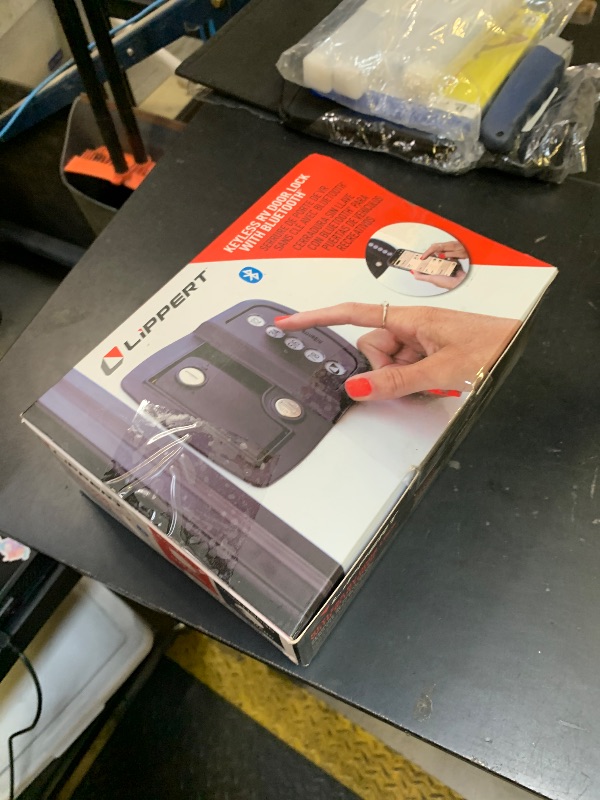 Photo 1 of Lippert Keyless RV Door Lock with 60' Bluetooth Range, Lighted Keypad Buttons, 3 Battery Modes, Aluminum Construction, Black Powder-Coated Finish, Right-Hand Latch Configuration - 2022119636