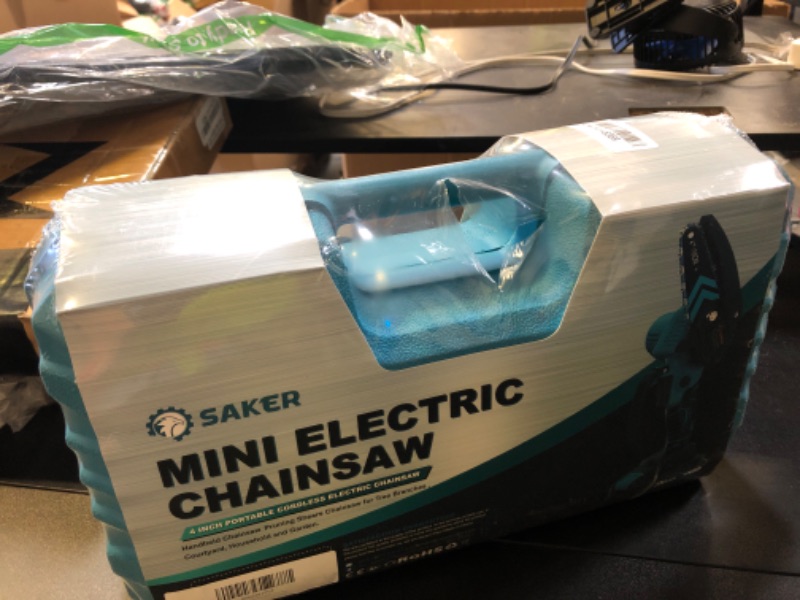 Photo 1 of Saker Mini Chainsaw,Portable Electric Cordless Chainsaw,Battery Powered,Small Power Handheld Chain Saws Pruning Shears for Tree Branches,Christmas Gifts for Men Dad Women(2 Batteries&3 Chains)