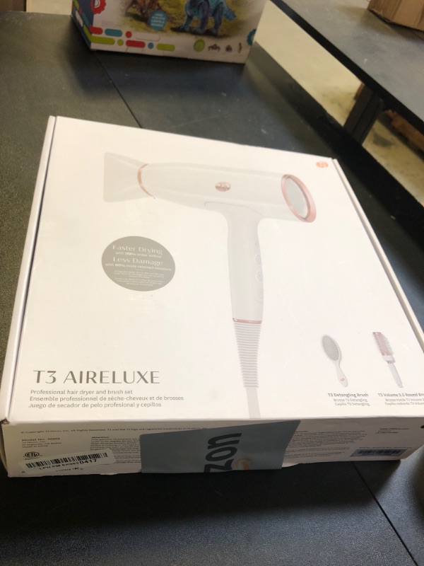 Photo 1 of T3 AireLuxe Professional Ionic Hair Dryer and Brush Set, with 5 Heat and 3 Speed Settings, Ion Generator, Cool Shot, Includes Paddle Brush and 2.5" Round Brush