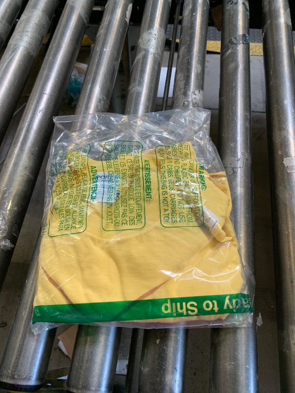 Photo 1 of SIZE LARGE YELLOW TEE