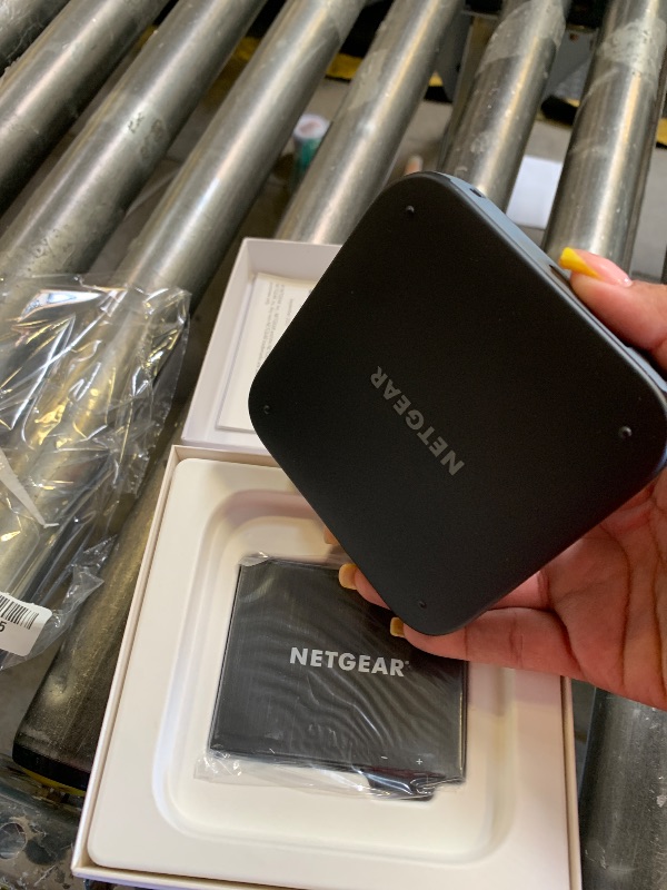 Photo 1 of NETGEAR Nighthawk M6 5G Mobile Hotspot, Router with Sim Card Slot, Modem, Portable WiFi Device for Travel, Unlocked with Verizon, AT&T, and T-Mobile, WiFi 6, 2.5Gbps (MR6150)