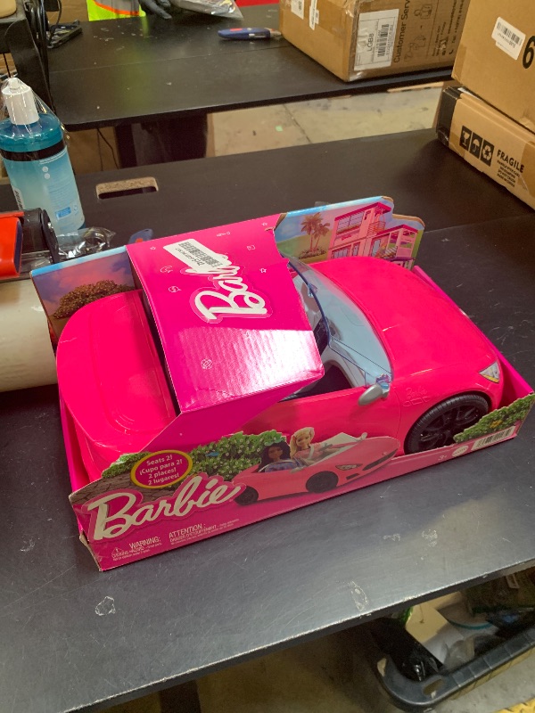 Photo 1 of Barbie Toy Car, Bright Pink Doll-Sized Convertible with 2 Seats, Seatbelts & Rolling Wheels, Realistic Details