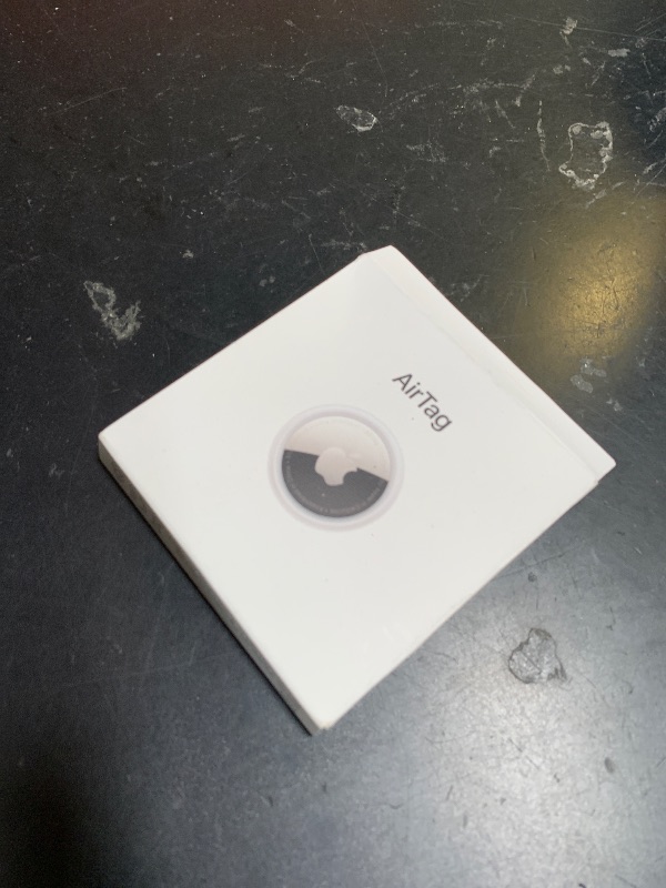 Photo 1 of Apple AirTag. Keep Track of and find Your Keys, Wallet, Luggage, Backpack, and More. Simple one-tap Set up with iPhone or iPad