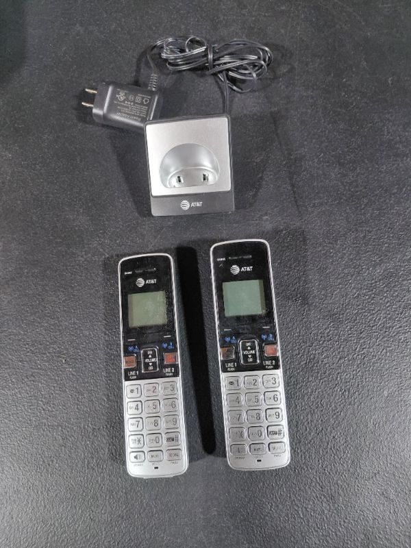 Photo 1 of A&T TL86103 DECT 6.02 PHONE SYSTEM WITH (2) DESK PHONES AND (2) CORDLESS PHONES