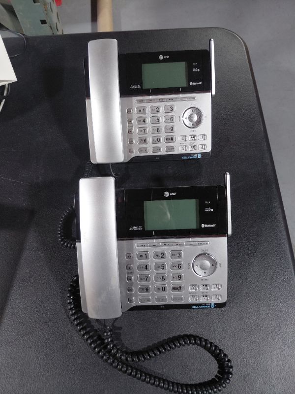 Photo 1 of A&T TL86103 DECT 6.02 PHONE SYSTEM WITH (2) DESK PHONES AND (2) CORDLESS PHONES