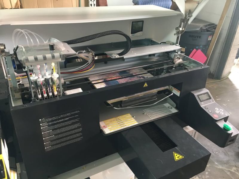 Photo 1 of BROTHER GT-381 DIGITAL GARMENT PRINTER WITH STAND (NOT WORKING)